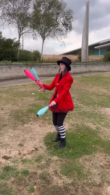 Chow with a mallet, parasol and bowler hat